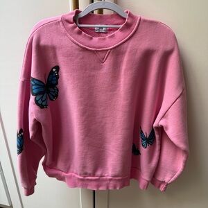 Pink Sweatshirt with Blue Butterfly Design